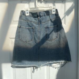 High waisted denim destroyed skirt